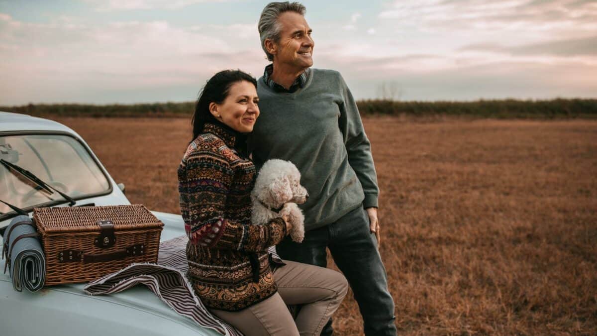 Couple and dog in the plains